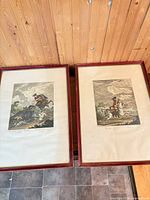 Both framed prints side by side