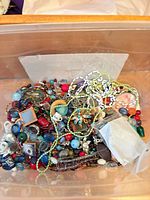 Top view of plastic bin with mixed beads
