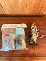 Full view of spindle and sealed felting kit on table