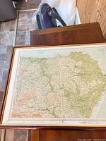 Full view of framed map on table