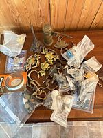 Overview of assorted hardware spread on table