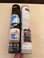 Two décor transfer tubes side by side showing labels and pattern names