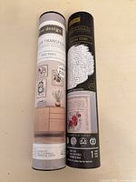 Both decor transfer tubes upright showing labels