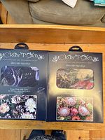 Two boxed Hokus Pokus Decor-Weave transfers side by side