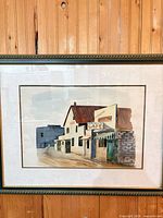 Full view of framed watercolour painting