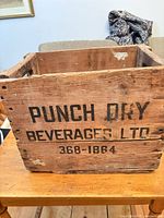 Front view showing stencilled brand and phone number