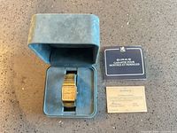 Watch in open Birks box with booklet and certificate