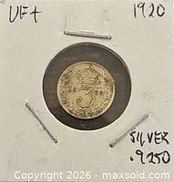 Coin in 2×2 holder showing reverse crowned 3 and date