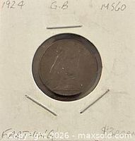 Coin in cardboard flip showing reverse Britannia design