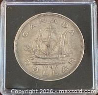 Reverse of 1949 Canada dollar showing sailing ship Matthew