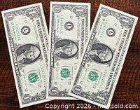 Three consecutive US $1 notes front side