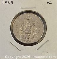 Coin in 2x2 flip, reverse side showing Canadian Coat of Arms and 50 CENTS legend