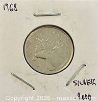 Full coin in cardboard holder with handwritten details