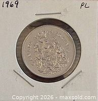 Reverse of 1969 Canadian 50-cent coin in holder