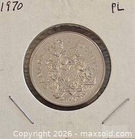 Reverse side of 1970 Canadian 50-cent coin in holder