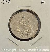 Reverse of 1972 Canada 50-cent coin in holder