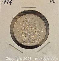 Reverse side of 1974 Canadian 50-cent coin in holder