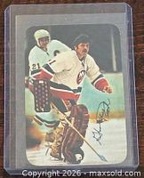 Front of 1977-78 O-Pee-Chee Glossy Glenn Resch #17 hockey card in sleeve