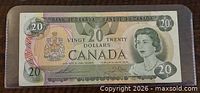 Front of 1979 $20 banknote showing Queen Elizabeth II and denomination