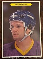 Front view of Marcel Dionne card showing colour image and name banner