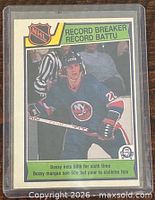 Front of 1983-84 O-Pee-Chee Record Breaker card in sleeve