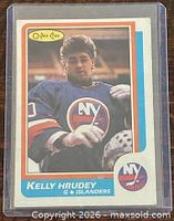 Front of O-Pee-Chee Kelly Hrudey #27 card in plastic sleeve