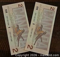 Reverse sides displaying American robins design