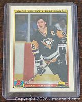 Front of 1990 Bowman Mario Lemieux Hat Tricks card showing player image and card details