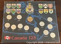 Front view of full 13-coin presentation card