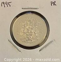 Reverse of 1995 Canadian 50-cent proof coin showing Coat of Arms