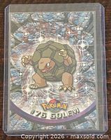 Front of 1999 Topps Pokémon #76 Golem card in holder