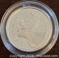 Reverse of 2025 Canada 25-cent fine silver proof coin showing caribou design and 25 CENTS denomination