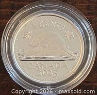 Reverse view showing beaver design, denomination, country, and year within protective capsule