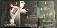 Front covers of all three House of Night hardcover novels