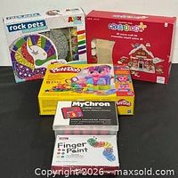 Group shot of all five boxed items