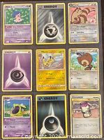 Front view of all nine Pokémon cards arranged 3 × 3
