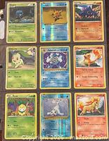 Front view of nine Pokémon cards in binder sleeve