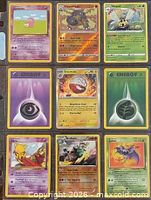 Front view of all nine Pokémon cards in sleeve page