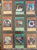 Front view of all nine cards in binder sleeve