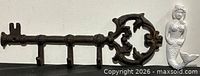 Cast iron key wall hook rack and white mermaid decor together