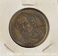 Obverse showing Dickens portrait and inscriptions
