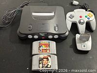 Console, controller, Transfer Pak, two cartridges grouped