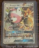 Front view of Bewear GX SM34 holographic card in plastic sleeve