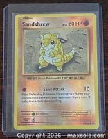 Front of Sandshrew card in protective sleeve