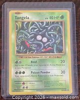 Front of Tangela card showing artwork, card number 8/108, in sleeve