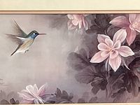 close-up of image area with hummingbird and flowers