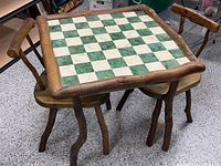 Overall view of log game table with two chairs