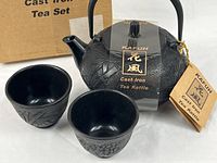 Full set showing teapot, two cups and box