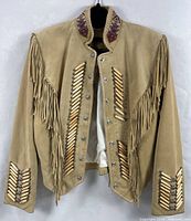 Front view showing fringe, pipe decoration, concho buttons