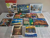 All 13 puzzle boxes on table